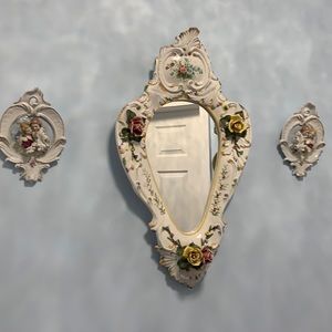 Porcelain mirror made in Italy 26”x 15”x4” plus 2 wall decorations 6”x9”